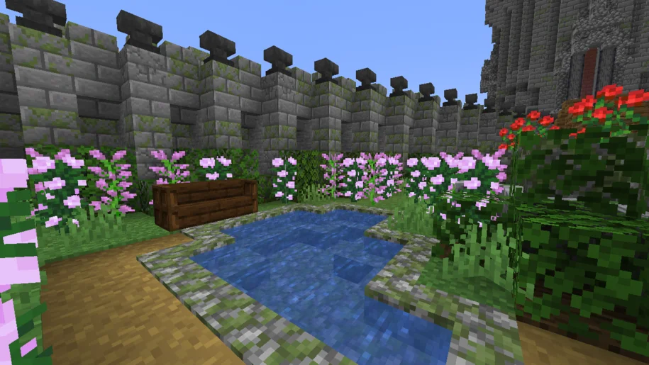 Minecraft pond surrounded by flowers
